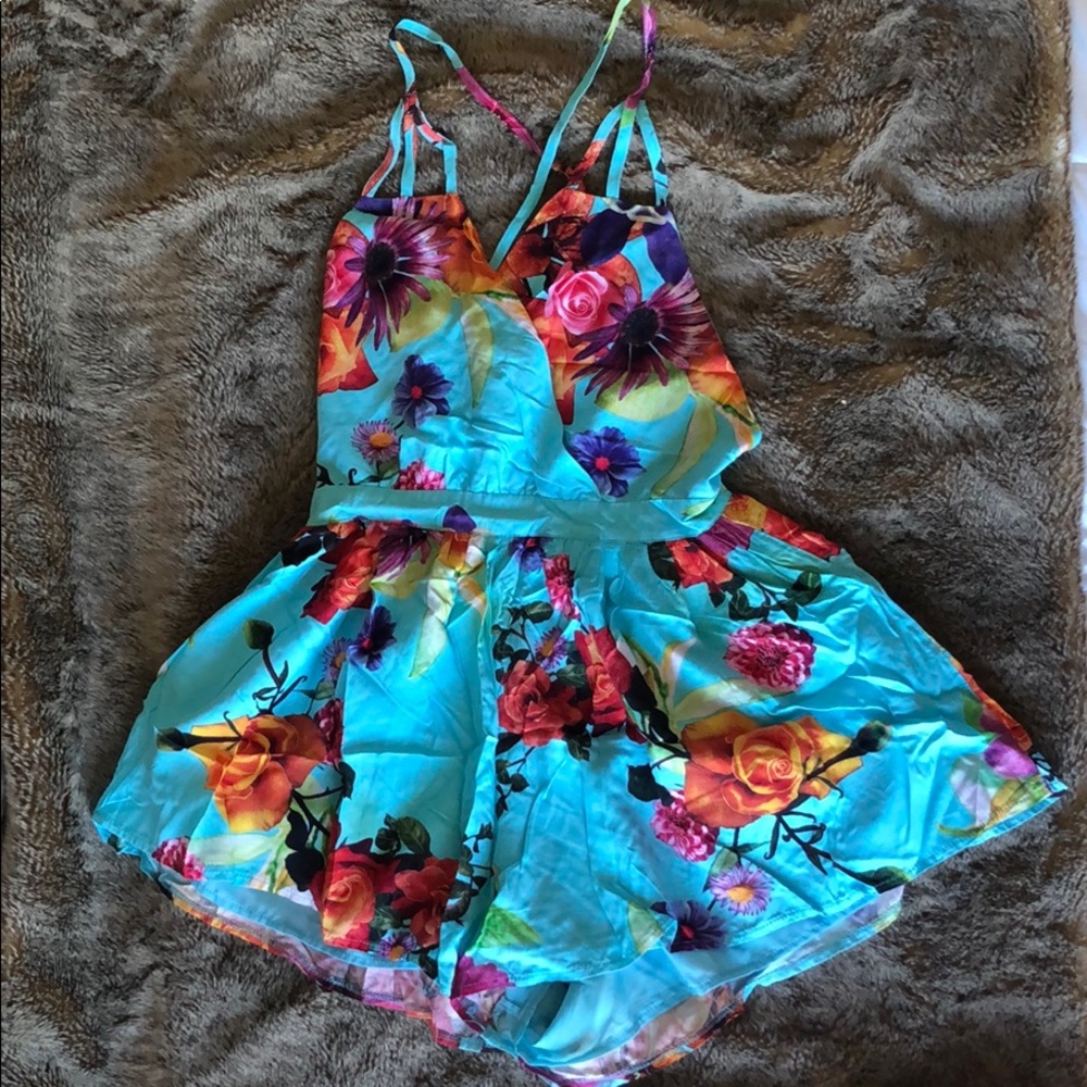 Beautiful bright blue LF romper by Angel Biba.